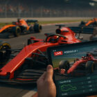 Scommesse Live Formula 1 su tablet durante gara con monoposto in pista