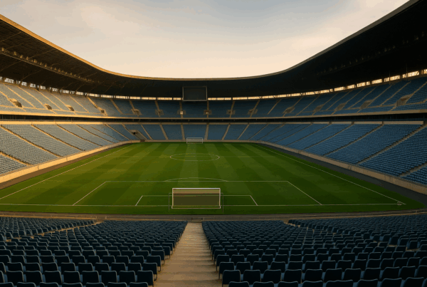 Stadio di calcio illuminato durante una partita decisiva, simbolo di come funzionano i Playoff e dell’atmosfera intensa delle sfide sportive.