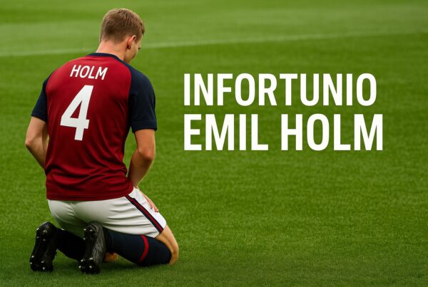 Calciatore con maglia rossoblù inginocchiato in campo mentre si tocca la gamba, rappresentando l’infortunio Emil Holm