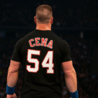 John Cena visto di spalle sul ring durante un match, simbolo della sua lunga carriera e delle oltre 1.800 vittorie — quanti match ha vinto John Cena.