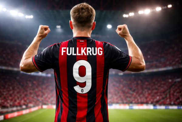 Niclas Fullkrug di spalle con la maglia del Milan numero 9 a San Siro, simbolo del trasferimento Fullkrug verso il Milan