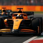 Quanto costa gareggiare in F1: due monoposto in pista durante un sorpasso ad alta velocità