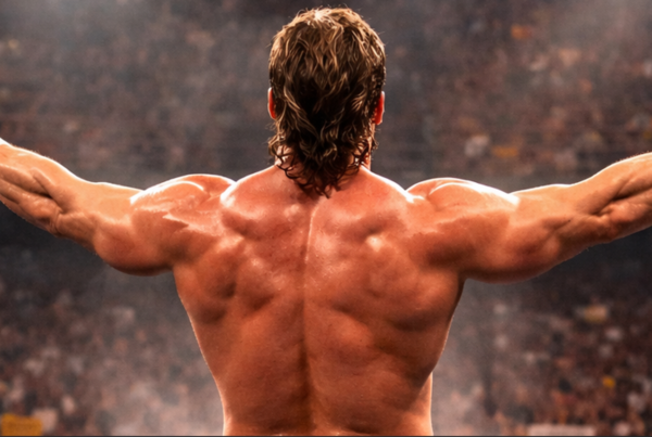 Ring di wrestling illuminato con figura stilizzata di spalle che rappresenta la carriera di Eddie Guerrero.