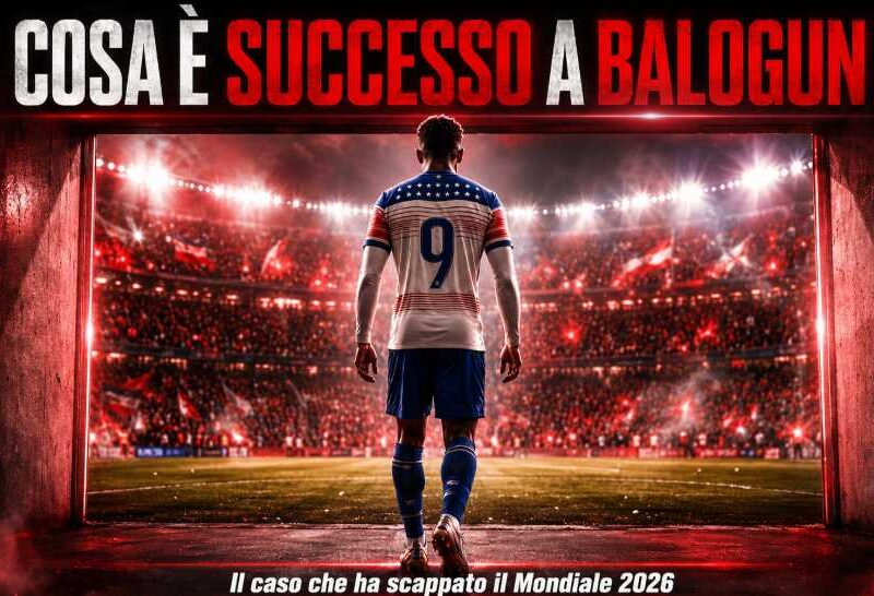 Immagine editoriale sportiva su Balogun visto di spalle all’ingresso dello stadio, con luci rosse, atmosfera da Mondiale 2026 e titolo: Cosa è successo a Balogun?