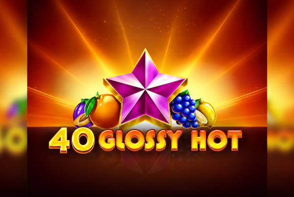 Slot 40 Glossy Hot di Amusnet con stella viola, frutta colorata e logo del gioco su uno sfondo luminoso dalle tonalità arancioni e dorate.