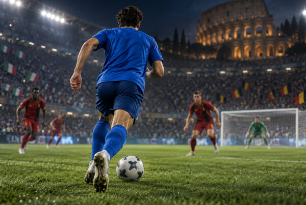 Illustrazione Pio Esposito Italia Belgio: attaccante azzurro di spalle avanza verso la porta con il pallone.